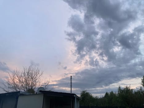 Thunderclouds before rain in a the village