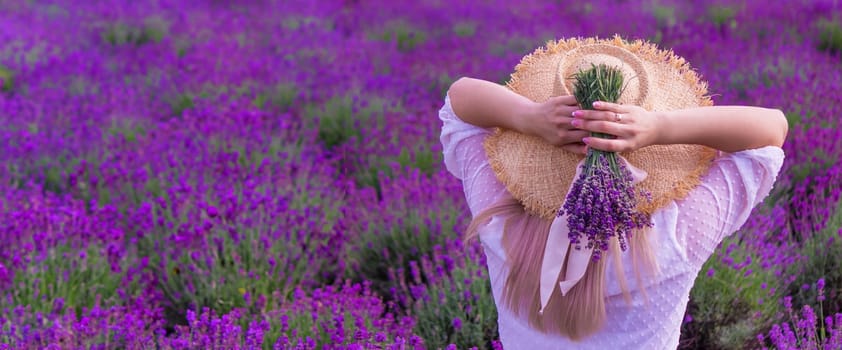 girl in lavender field. Selective focus. Nature