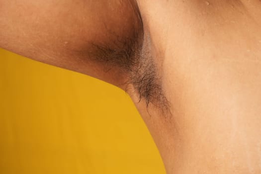 unshaved hairy man armpit, a lot of hair on the armpit