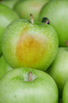 stack of Rotten apple in a bowl .