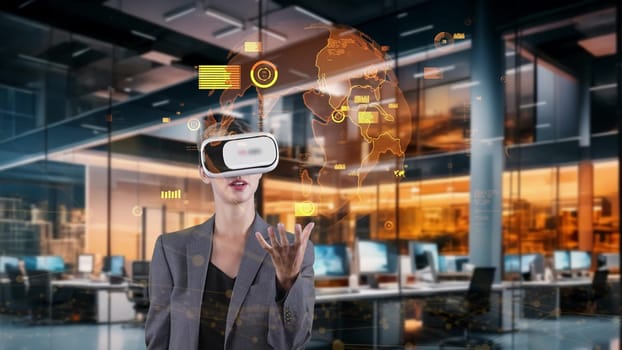 Woman taking up circle finance data dynamic world monitor by VR future global market interface digital infographic network technology virtual hologram animation at orange modern office. Contraption.