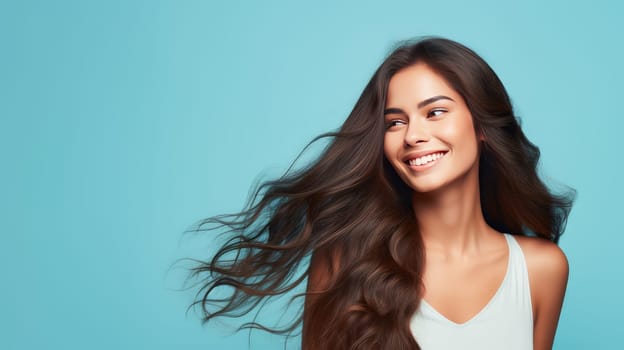 Beautiful, elegant, sexy Latino, Spain woman with long hair with perfect skin, light blue background banner. Advertising of cosmetic products, spa treatments, shampoos and hair care products, dentistry and medicine, perfumes and cosmetology for women