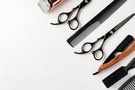 Set of barber tools for haircut on gray background flat lay studio shot