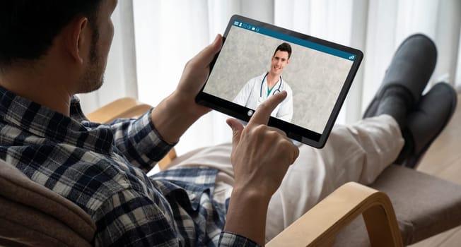 Doctor video call online by modish telemedicine software application for virtual meeting with patient