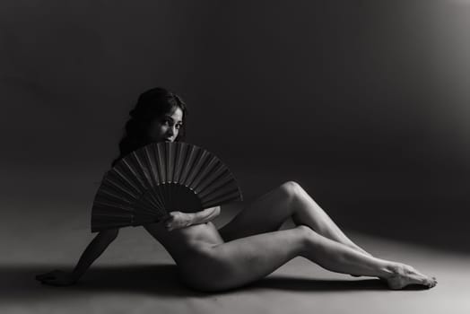 Female nude silhouette, a young seductive woman with naked body