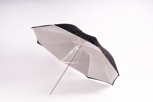 Photography studio light reflector isolated on white background umbrella