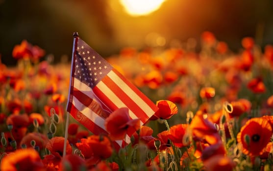 The American flag waves gently among poppies in the fading light of dusk, a powerful symbol of honor and memory