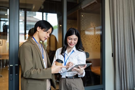 Employee business woman talking, consulting, exchanging idea, asking for advice from manager.