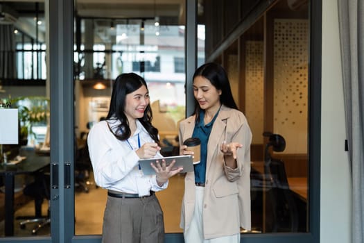 Employee business woman talking, consulting, exchanging idea, asking for advice from manager.