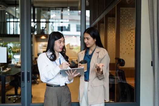 Employee business woman talking, consulting, exchanging idea, asking for advice from manager.