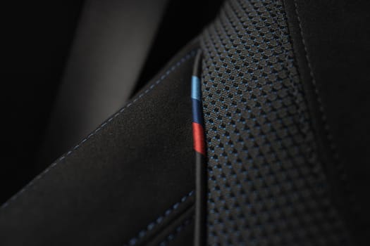BMW M-package black alcantara texture car seat. . High quality photo.