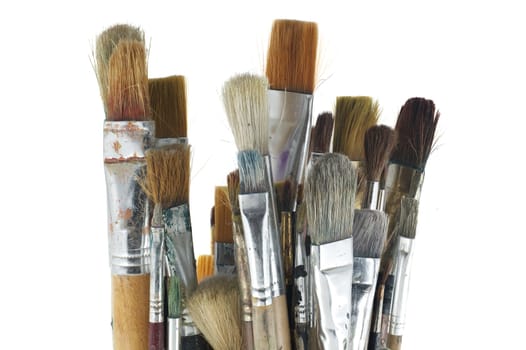 Assortment of various types and sizes of paintbrushes isolated on white background