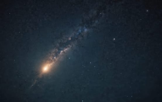 The Milky Way galaxy, an astronomical object, is visible in the electric blue sky at midnight. A celestial event to observe in the field of astronomy and space science