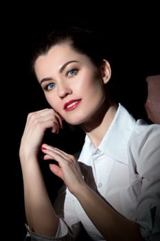 Studio portrait of beautiful young woman with perfect makeup