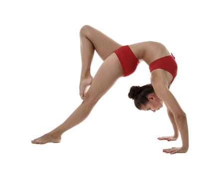 Image of flexible girl doing gymnastic pose, isolated on white