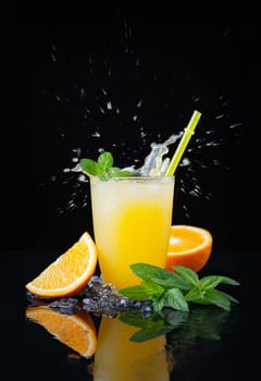 Orange ice drink with splash.