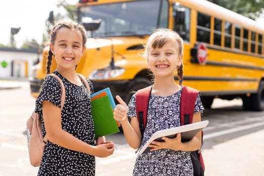 Basic school students crossing the road.