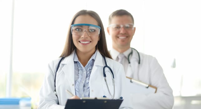 Group medicine doctors in protective googles portrait. Medical education concept