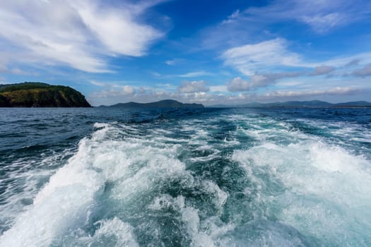 Boat trip on sunny day. Image of waves and sea. Thailand