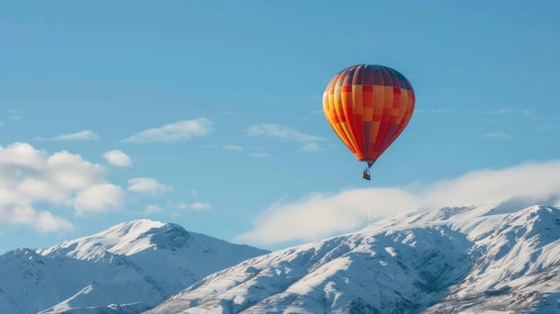 Hot air balloon floating over snow mountain with copy space area
