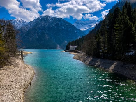 Faboulus landscape of mountain river with turquoise water near of Zugspitze summit under sunlight. alps, Austria, Europe. High quality photo