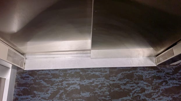 The detailed view of an elevator threshold where the cabin meets the building floor, highlighting the transition space that facilitates safe entry and exit.