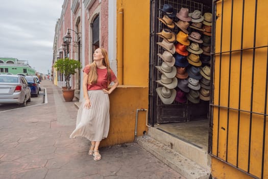 Woman tourist explores the vibrant streets of Valladolid, Mexico, immersing herself in the rich culture and colorful architecture of this charming colonial town.