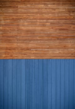 blue metal siding and wooden boards on the facade as a background 3