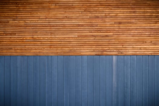 blue metal siding and wooden boards on the facade as a background 6