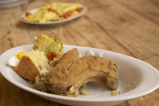 fried lamb chops in a serving dish