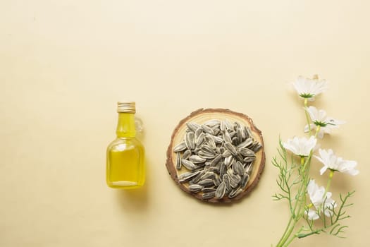 sunflower oil seed and oil in a container on table ,