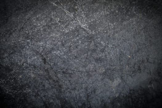 Black or dark gray rough grainy stone texture background 1