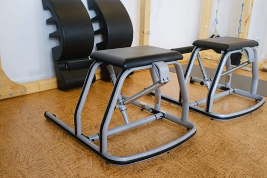 Pilates exercise equipment - yoga gym chair. Pilates equipment.