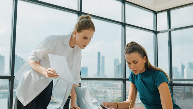 Smart businesswoman present start up project while executive manager listen carefully. Professional business team working together, sharing, discussing, thinking about business idea. Tracery