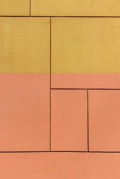 Close-up of the wall of a house , forming rectangles that looks like an abstract painting.Painted wall textures 1