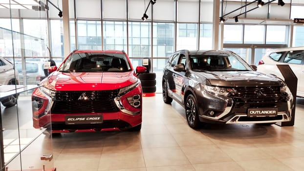 Cheboksary, Russia - March 20, 2023: Cars in showroom of dealership Mitsubishi