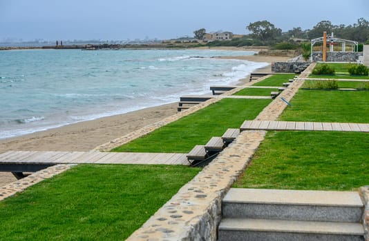 Beautiful beach. Chairs on the sandy beach near the sea.2