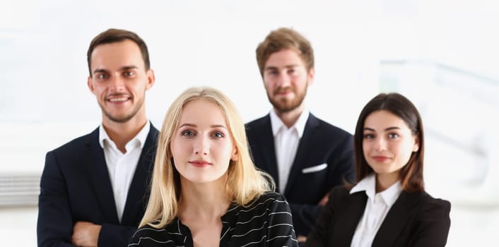 Group of smiling people stand in office looking in camera portrait. White collar power mediation solution project creative advisor participation profession train bank lawyer client visit concept