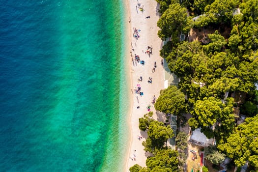 Beautiful aerial view of Punta Rata beach in Brela, Makarska Riviera, Croatia. Aerial view of Punta Rata beach and waterfront on Makarska riviera, Brela, Dalmatia region of Croatia.
