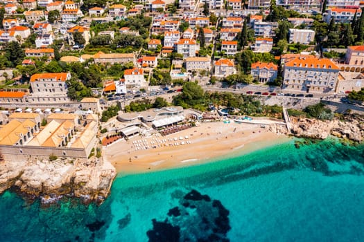 Beautiful beach Banje and Dubrovnik touristic destination, Croatia. Banje beach in Dubrovnik aerial view, Dalmatia region of Croatia.