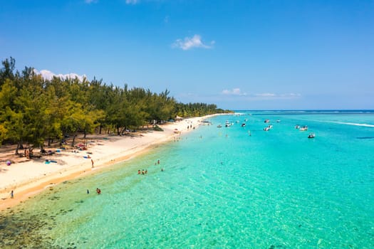 Tropical scenery, beautiful beaches of Mauritius island, Le Morne, popular luxury resort. Le Morne beach luxury resorts, Mauritius. Luxury beach in Mauritius, sandy beach with palms and blue ocean. 