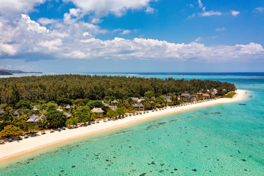 Tropical scenery, beautiful beaches of Mauritius island, Le Morne, popular luxury resort. Le Morne beach luxury resorts, Mauritius. Luxury beach in Mauritius, sandy beach with palms and blue ocean. 