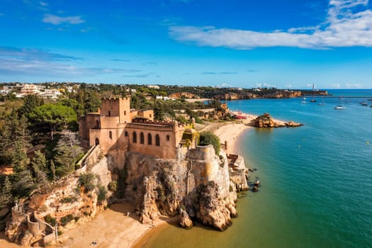 The Fort of Sao Joao do Arade (Castle of Arade) in Ferragudo Village, Algarve. Beach and castle Sao Joao do Arade in Ferragudo in the Algarve in Portugal.