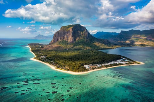 Aerial view of Mauritius island panorama and famous Le Morne Brabant mountain, beautiful blue lagoon. Aerial view of Le morne Brabant in Mauriutius.
