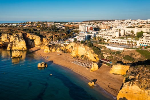 Praia de Dona Ana beach with turquoise sea water and cliffs, Portugal. Beautiful Dona Ana Beach (Praia Dona Ana) in Lagos, Algarve, Portugal. Praia de Dona Ana in Lagos in the Algarve, Portugal.