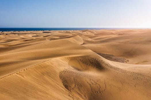 View of the Natural Reserve of Dunes of Maspalomas, in Gran Canaria, Canary Islands, Spain. Beautiful view of Maspalomas Dunes on Gran Canaria, Canary Islands, Spain.