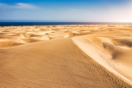 View of the Natural Reserve of Dunes of Maspalomas, in Gran Canaria, Canary Islands, Spain. Beautiful view of Maspalomas Dunes on Gran Canaria, Canary Islands, Spain.