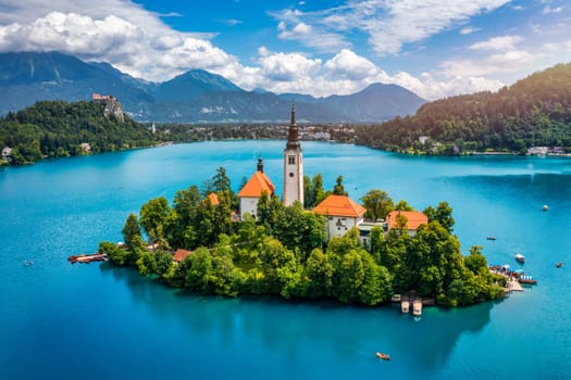 Lake Bled in Slovenia. Beautiful mountains and Bled lake with small Pilgrimage Church. Bled lake and island with Pilgrimage Church of the Assumption of Maria. Bled, Slovenia, Europe.