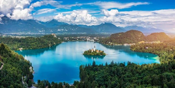Lake Bled in Slovenia. Beautiful mountains and Bled lake with small Pilgrimage Church. Bled lake and island with Pilgrimage Church of the Assumption of Maria. Bled, Slovenia, Europe.