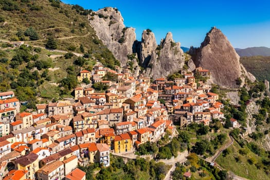 The picturesque village of Castelmezzano, province of Potenza, Basilicata, Italy. Cityscape aerial view of medieval city of Castelmazzano, Italy. Castelmezzano village in Apennines Dolomiti Lucane.